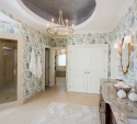 The client chose and Asian toile (repeating story pattern) for the wall treatment. You'll notice the dark ceiling; we did this to create contrast/drama to the lighter room palette.